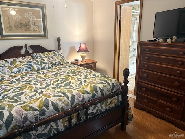 911 Santa Anna Dr, Alamo, TX 78516 - bedroom with wood finished floors