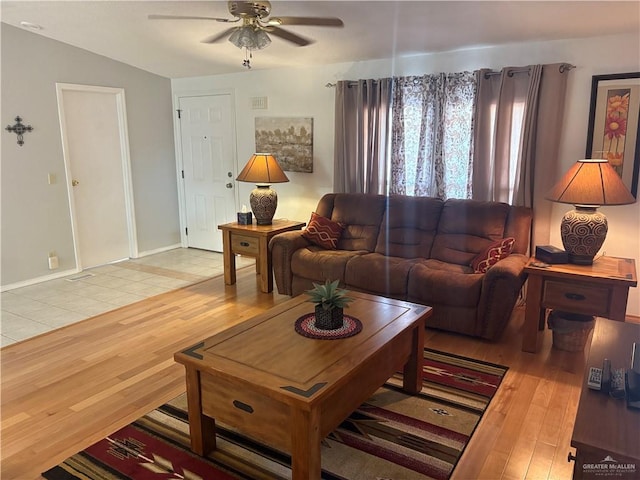 911 Santa Anna Dr, Alamo, TX 78516 - living area with light wood finished floors and a ceiling fan