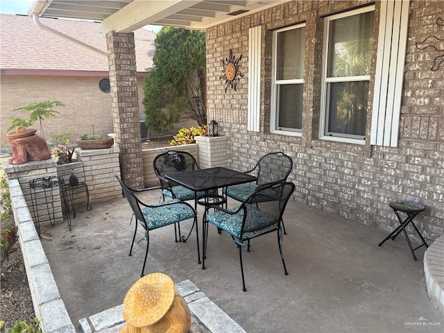 911 Santa Anna Dr, Alamo, TX 78516 - view of patio featuring outdoor dining area
