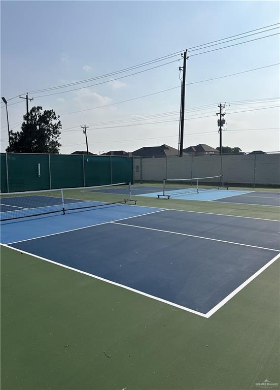 911 Santa Anna Dr, Alamo, TX 78516 - view of tennis court with fence