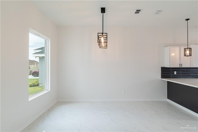 view of unfurnished dining area