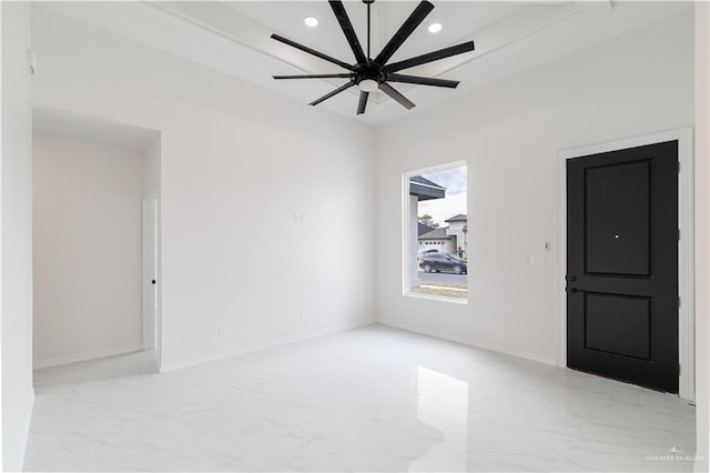 spare room with ceiling fan