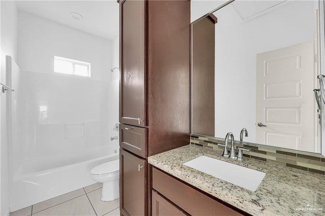 full bathroom featuring vanity,  shower combination, tile patterned flooring, toilet, and tasteful backsplash