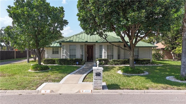 1717 Edward Dr, Edinburg, TX 78539 - view of front of house featuring a standing seam roof and metal roof