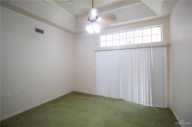 1717 Edward Dr, Edinburg, TX 78539 - spare room featuring ceiling fan, carpet floors, plenty of natural light, and a tray ceiling