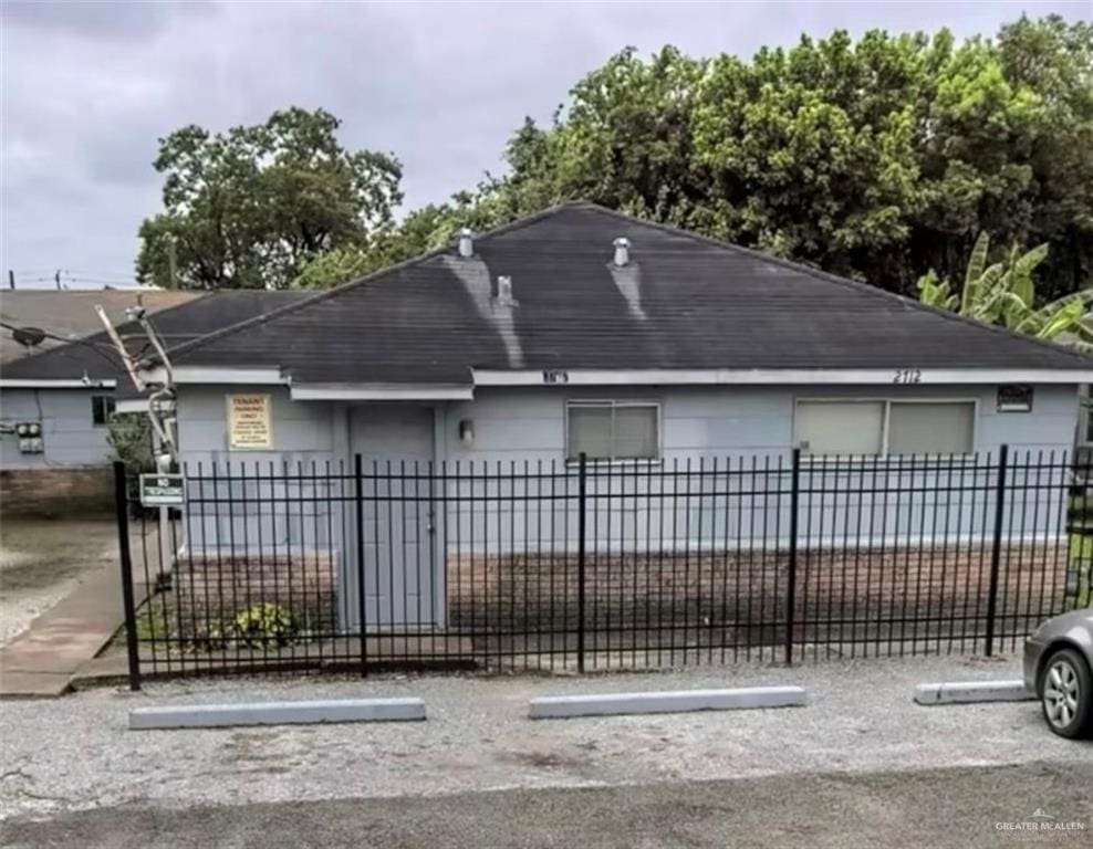 exterior space with a fenced front yard