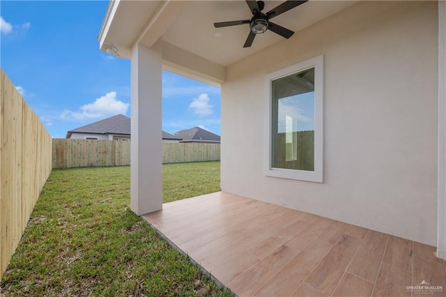 2205 Cardinal Dr, Weslaco, TX 78596 - fenced backyard featuring a ceiling fan