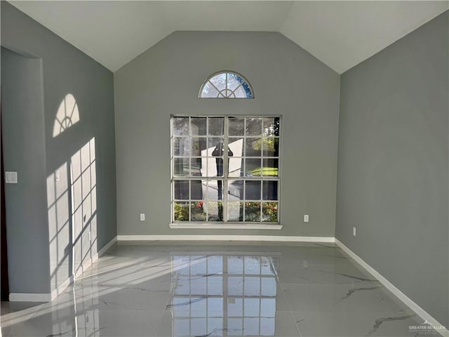 unfurnished dining area with lofted ceiling