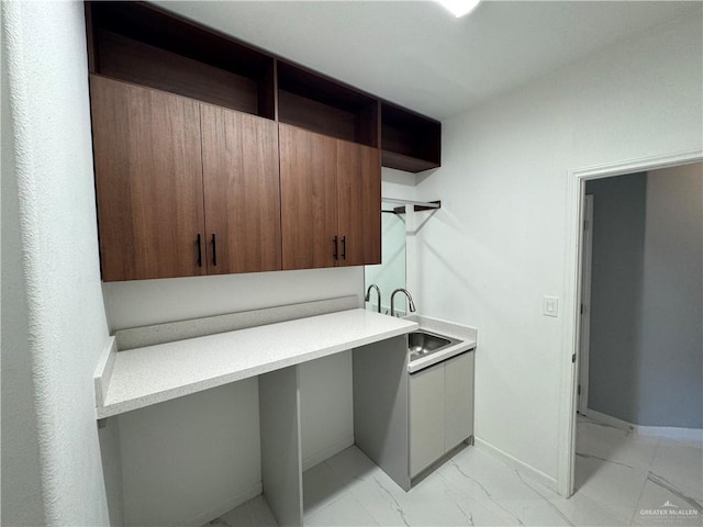 laundry room featuring sink