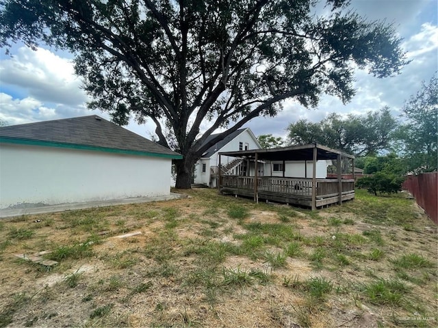 view of yard with a deck