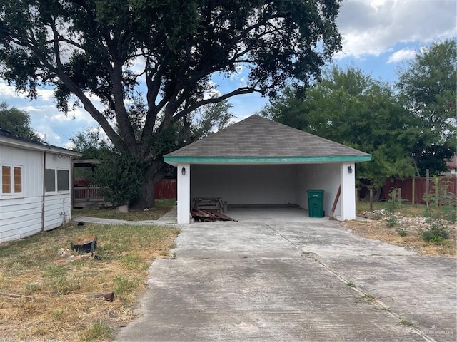 exterior space with a carport