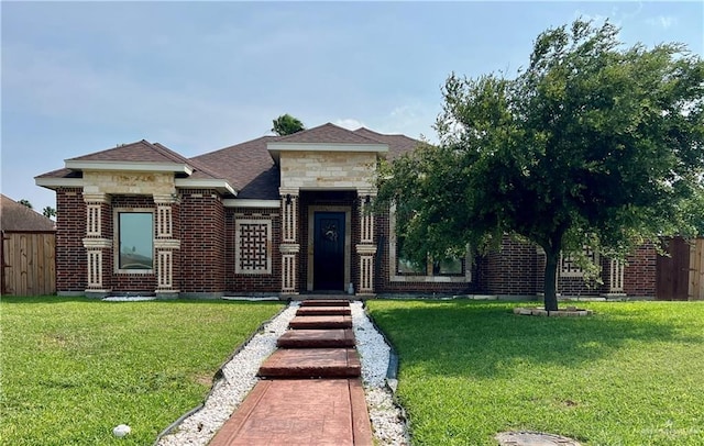 600 Gable Dr, Pharr, TX 78577 - view of front facade with brick siding, stone siding, and a shingled roof
