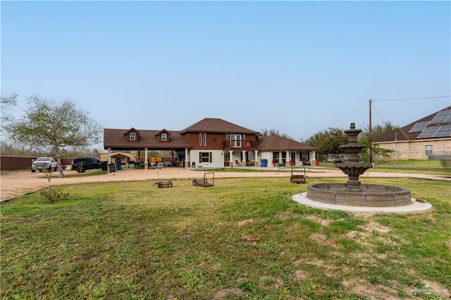 view of front of property featuring a front lawn