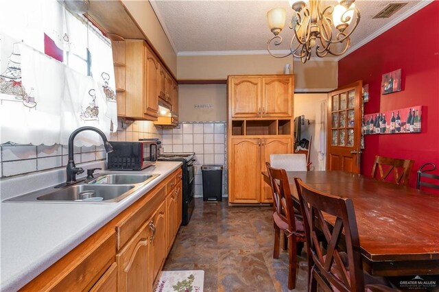 kitchen with ornamental molding, sink, black appliances, a chandelier, and hanging light fixtures