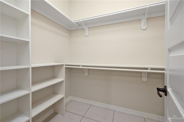 109 Aaron St, Mercedes, TX 78570 - walk in closet with tile patterned floors