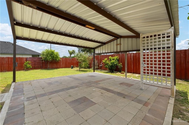 109 Aaron St, Mercedes, TX 78570 - view of patio / terrace with a carport