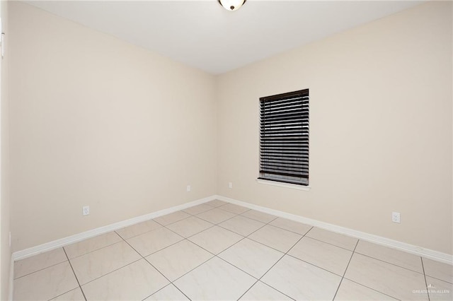 109 Aaron St, Mercedes, TX 78570 - spare room with light tile patterned flooring and baseboards
