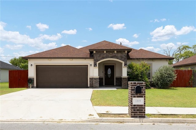 109 Aaron St, Mercedes, TX 78570 - view of front facade with a garage, concrete driveway, stucco siding, and a shingled roof