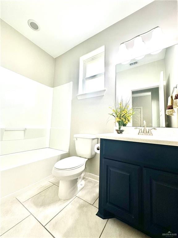 full bathroom featuring tile patterned flooring, vanity, shower / washtub combination, and toilet