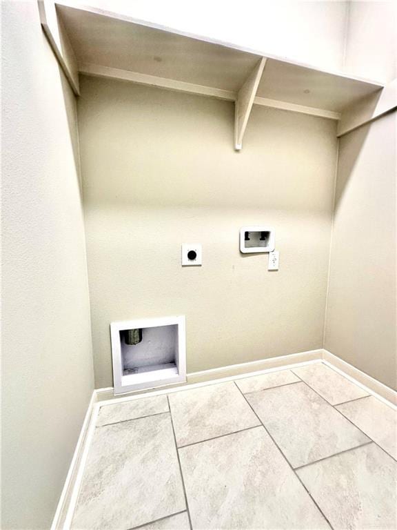 laundry room featuring washer hookup, tile patterned floors, and hookup for an electric dryer