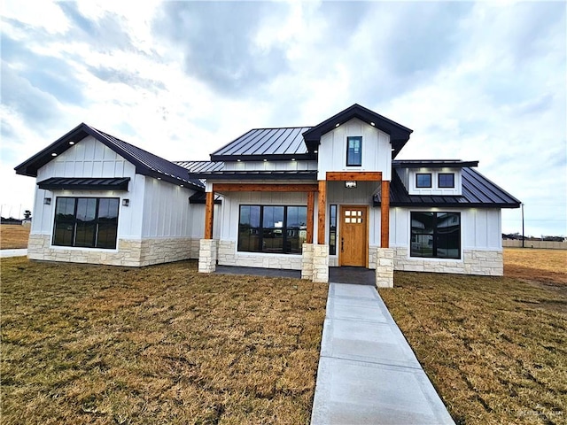 modern farmhouse with a front yard