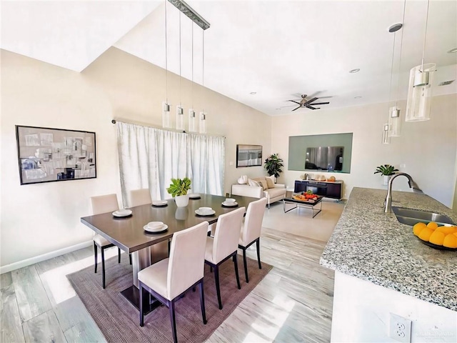 8706 Pink Flamingo St, Harlingen, TX 78552 - dining room with ceiling fan and light wood finished floors
