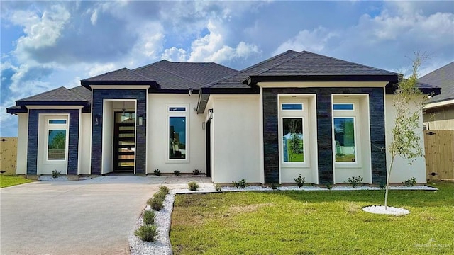 1205 Moses Dr, San Juan, TX 78589 - view of front facade featuring a shingled roof