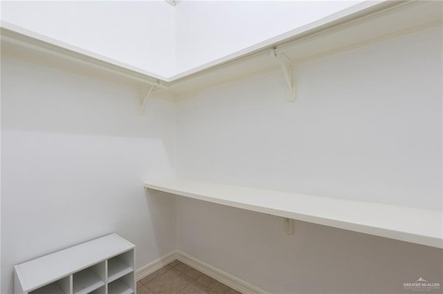 walk in closet featuring tile patterned floors