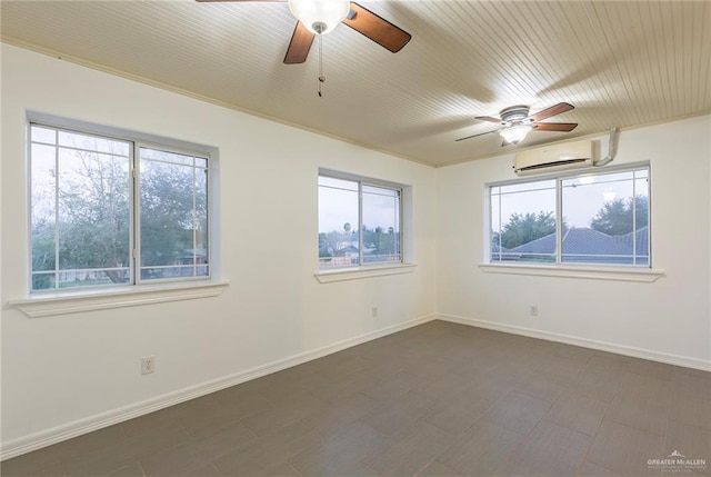 spare room featuring a wall mounted air conditioner