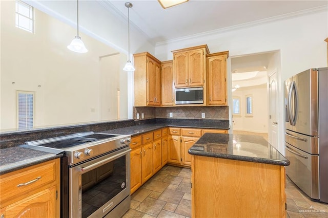 kitchen featuring appliances with stainless steel finishes, backsplash, ornamental molding, pendant lighting, and a kitchen island