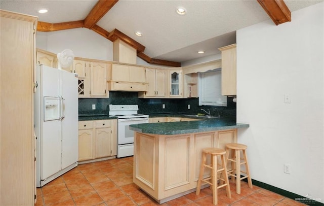 kitchen featuring kitchen peninsula, backsplash, white appliances, sink, and lofted ceiling with beams