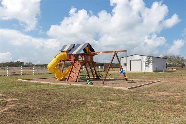 view of play area featuring a yard and fence