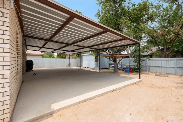 3408 Whiskey Dr, Pharr, TX 78577 - view of parking / parking lot featuring a fenced backyard and a carport