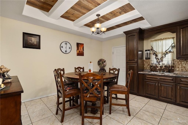 dining room with beam ceiling, baseboards, wood ceiling, light tile patterned floors, and a notable chandelier
