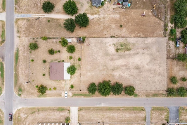 birds eye view of property featuring a rural view