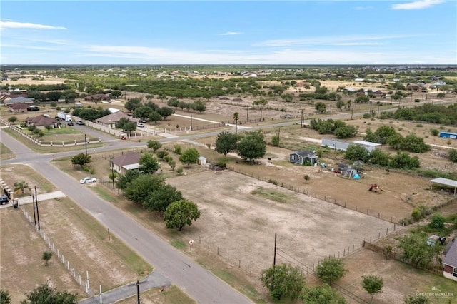 birds eye view of property featuring a rural view