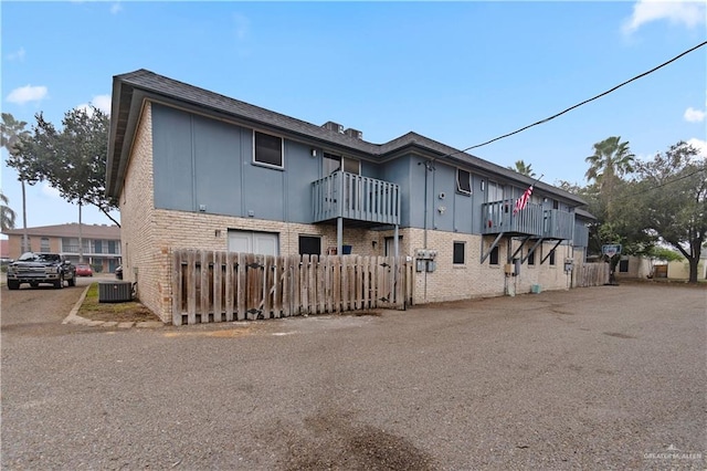 view of property exterior with central AC unit