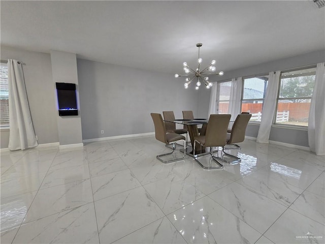 dining room with a chandelier