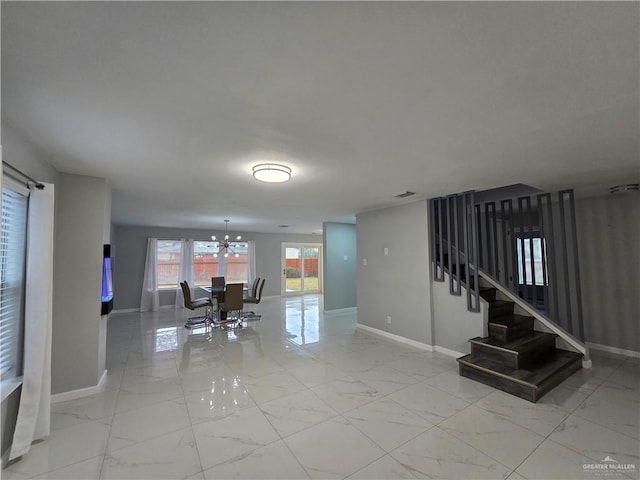 interior space featuring a notable chandelier