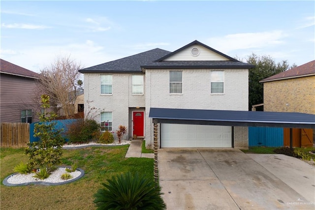 view of front property with a garage and a front yard