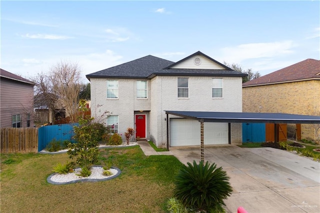 front of property featuring a carport, a garage, and a front lawn