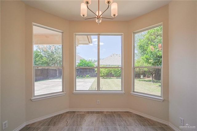 interior space featuring an inviting chandelier