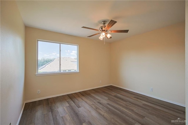 spare room featuring ceiling fan and hardwood / wood-style floors