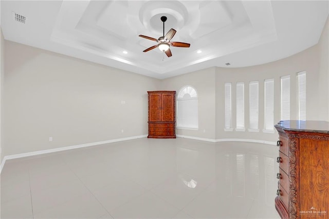 1410 Lobelia St, Weslaco, TX 78599 - unfurnished room featuring a raised ceiling, a ceiling fan, and recessed lighting