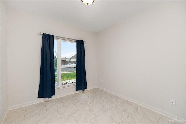 view of tiled spare room