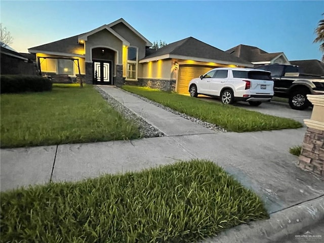 view of front of house with french doors and a front yard