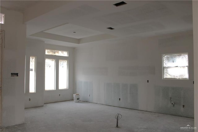 empty room with a tray ceiling