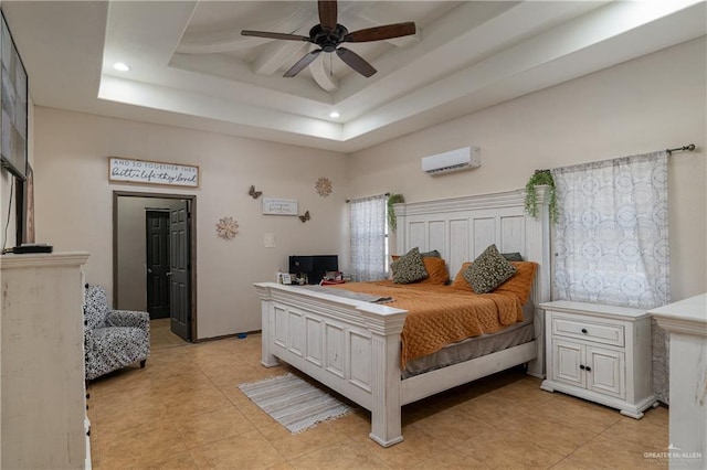 bedroom featuring a wall mounted air conditioner, a tray ceiling, ceiling fan, and light tile patterned flooring