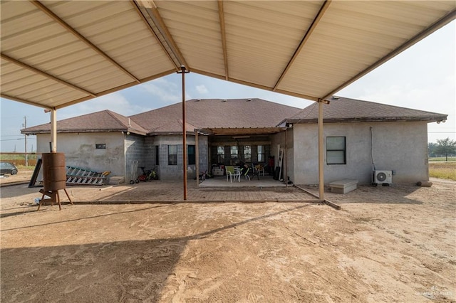 rear view of property with a patio