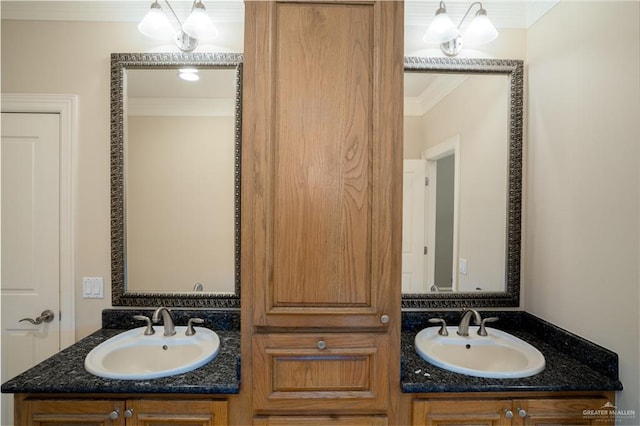 bathroom with vanity and crown molding